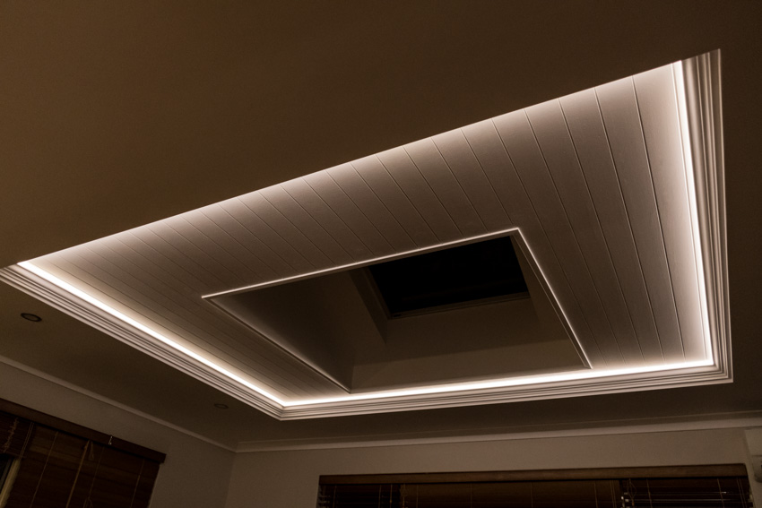 Beadboard drop ceiling with lighting fixture