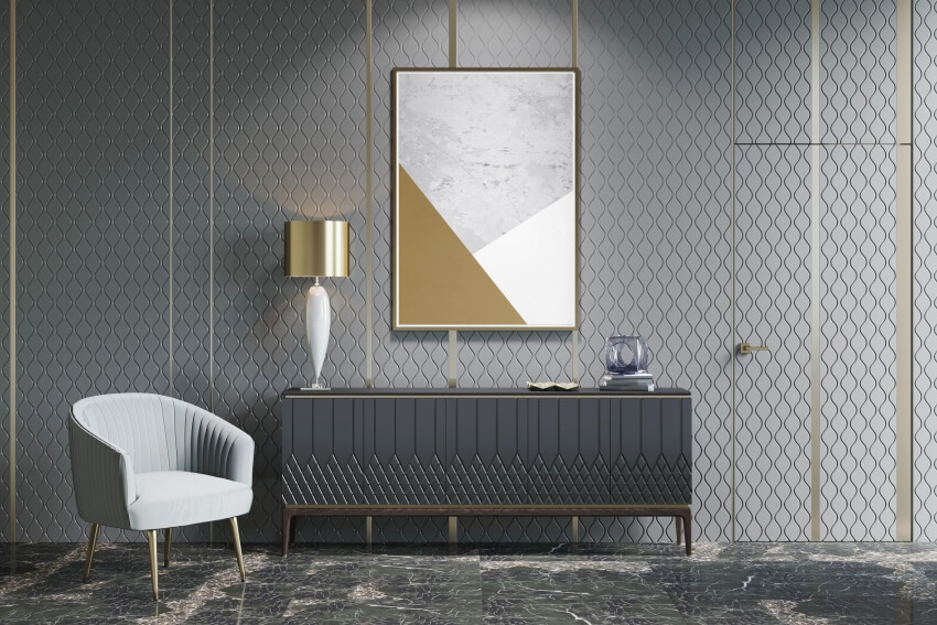 A beautiful and sophisticated gray interior with console table, camouflage hidden door and arm chair