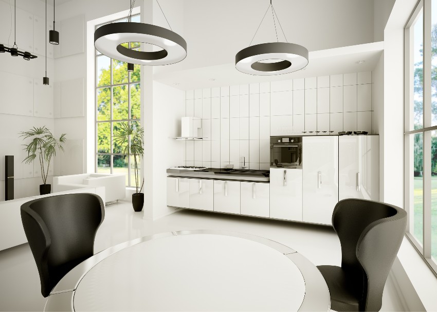 Black and white kitchen interior with tile panels on walls, natural lighting and modern pendant lights