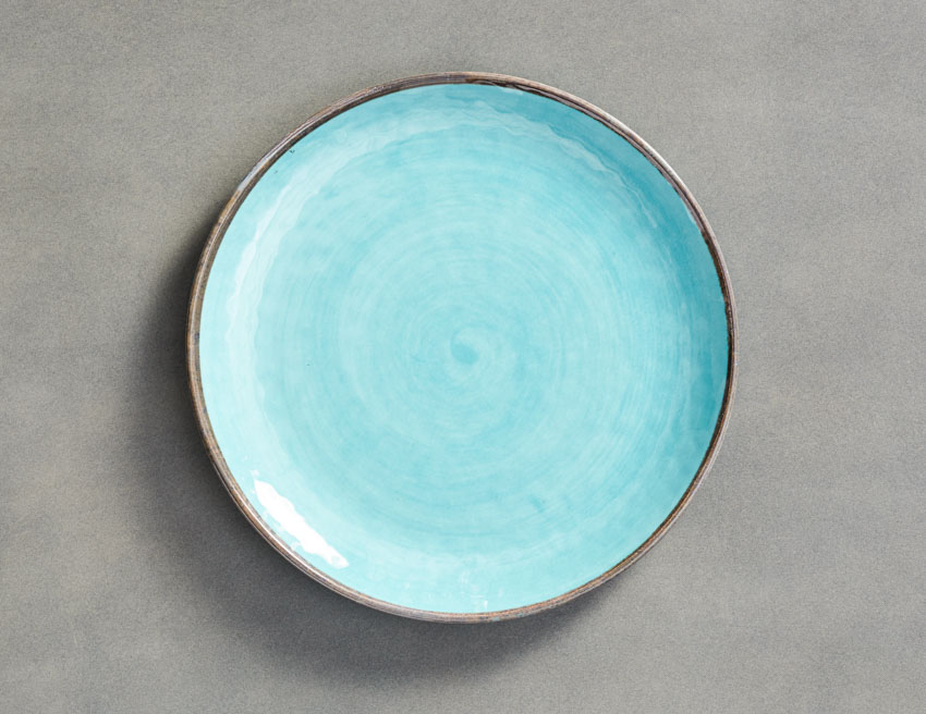 Blue melamine plate for dining purposes