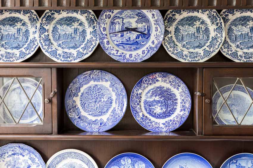 Cabinet shelves with a collection of fine china 