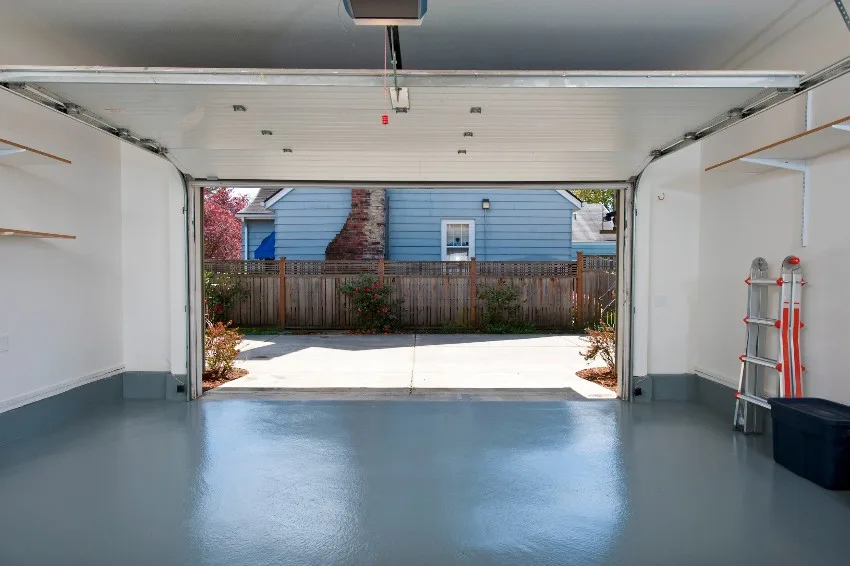 A clean garage with open door