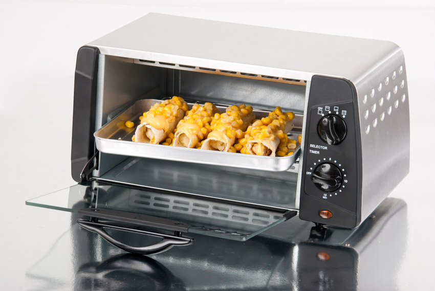 Convection toaster with food in it