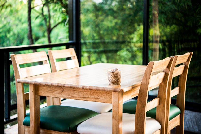 Dining room with wood chairs, and table