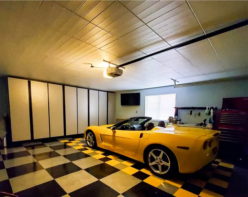 Yellow car with checkerboard flooring