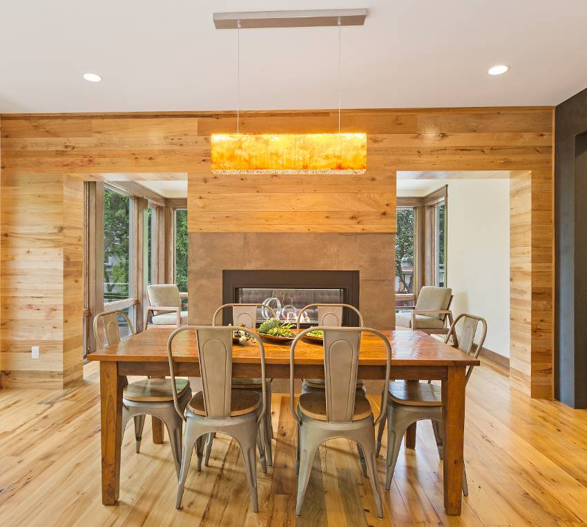 Gorgeous rustic dining space with a unique chandelier