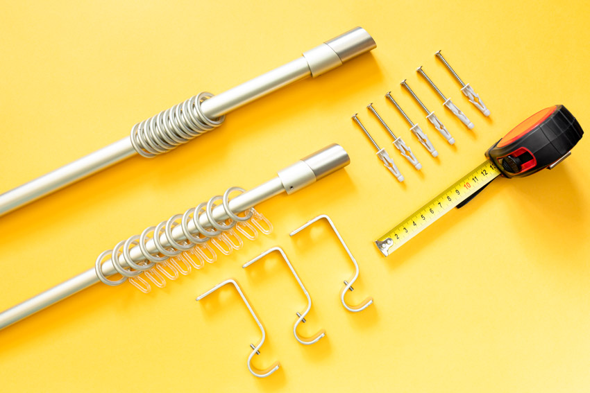 Hardware and tools used for curtain rod installation