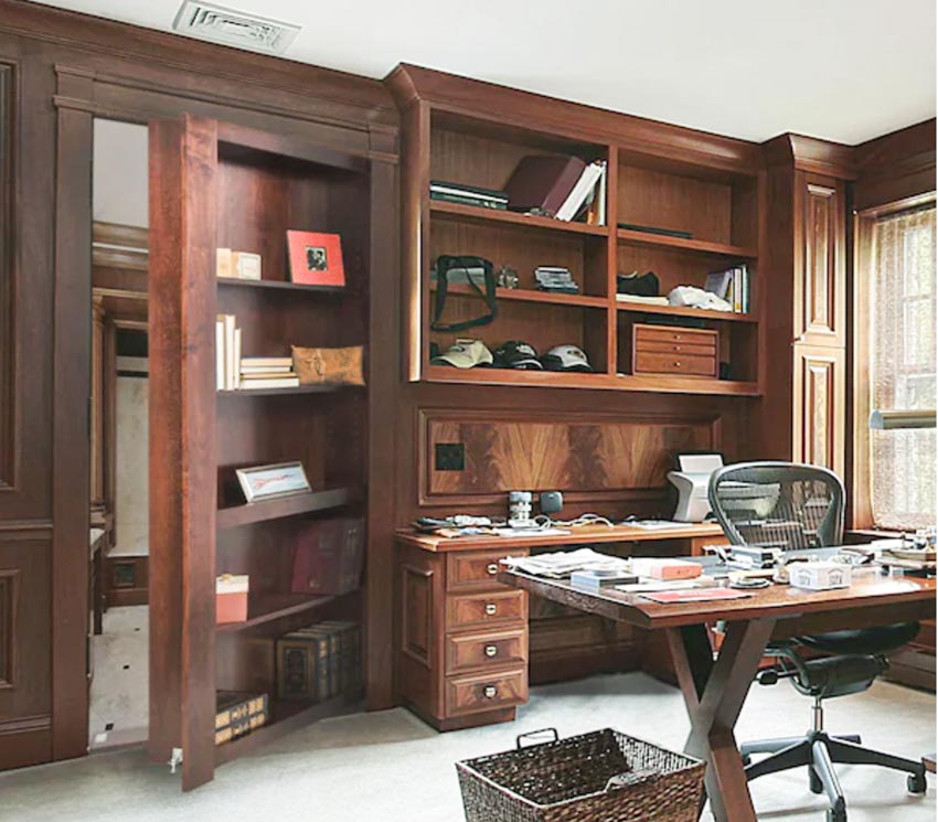 Home office with murphy door, bookcase, table, chair, and window