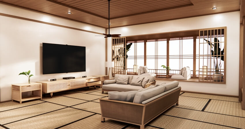 Japanese traditional style cinema room at home with large sofas and room mats
