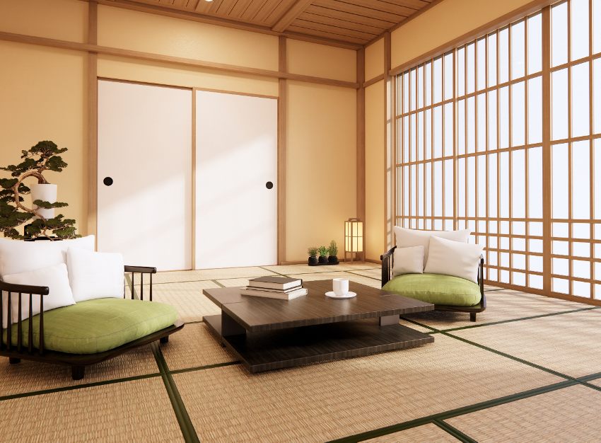 Japanese style room with shoji and fusuma doors, tatami mat flooring, armchairs and tea table