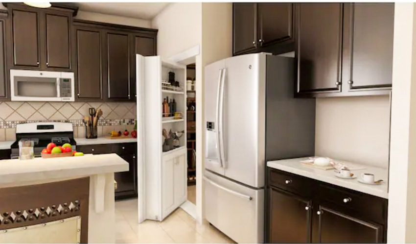 Kitchen with backsplash, cabinets, countertops, refrigerator, and pantry murphy door