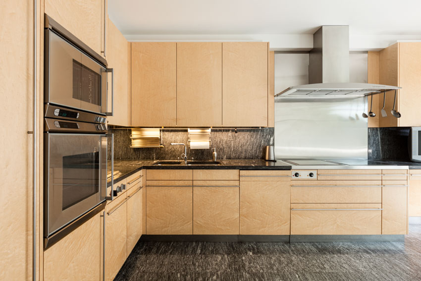 Kitchen with backsplash and countertops with backlights