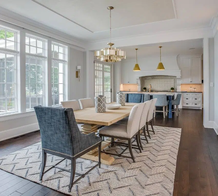Brass chandeliers and large dining set with carpet 