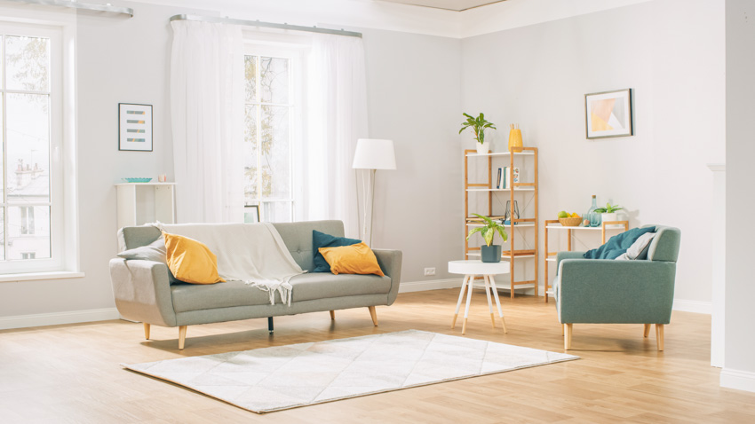 Continental style curtains matched with pale jewel toned sofa set