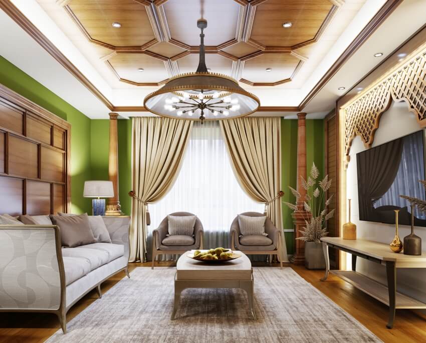 Living room with green walls and wood furnishings and arabic style decor with beautiful double sided curtains