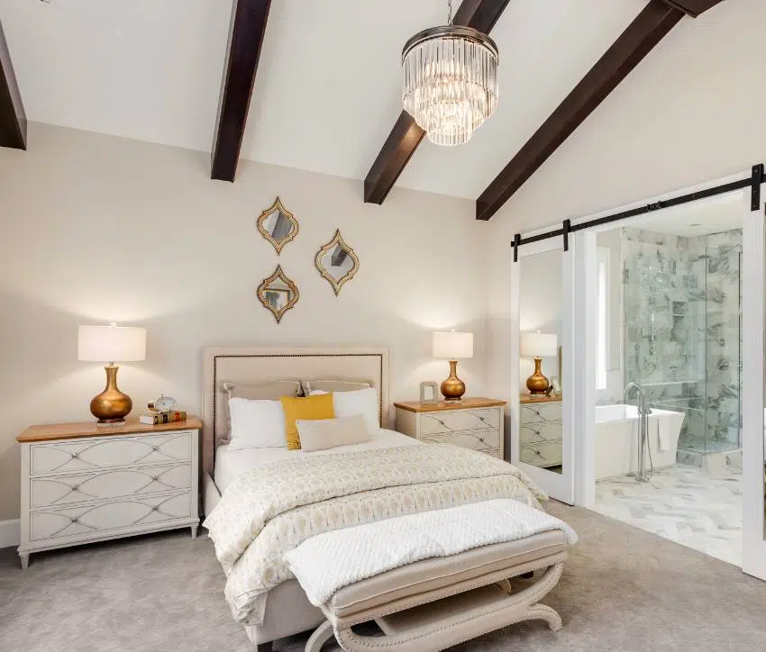 Master bedroom with tiered chandeliers 