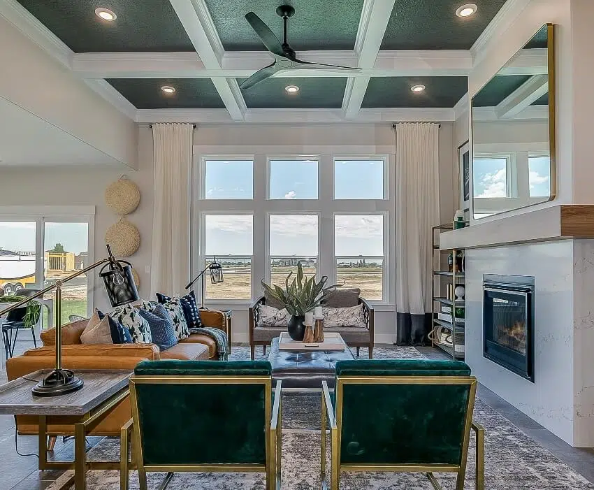 Mid century modern style room with green coffered ceiling and fireplace
