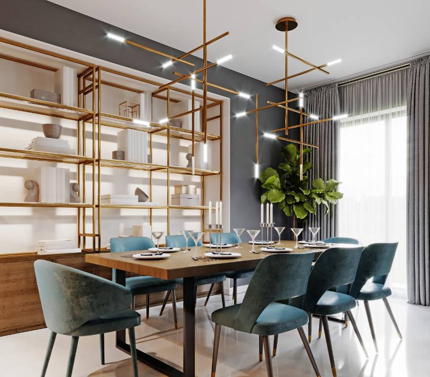 Modern dining room design with stylish chandelier, large wooden dining table top and fabric blue chairs
