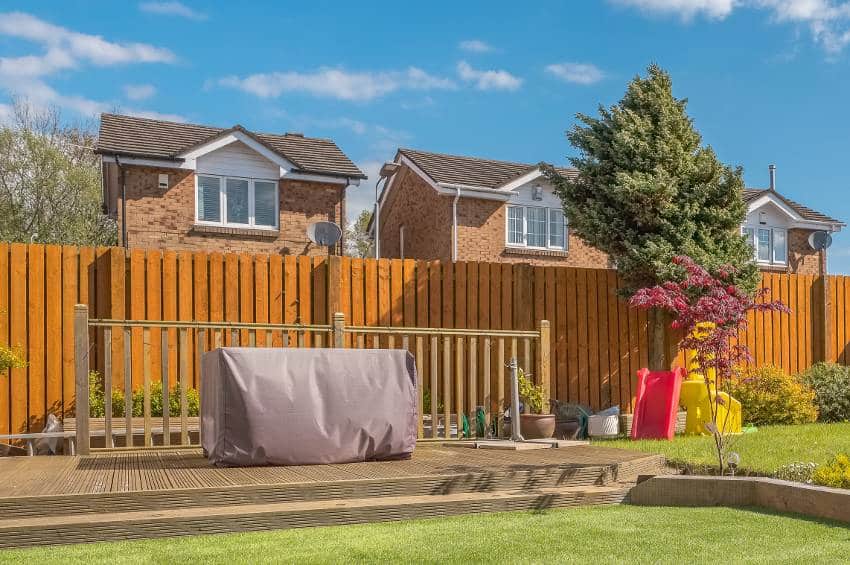 A modern landscaped garden with Douglas fir privacy fence