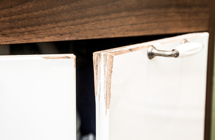 Particle board cabinets with water damage