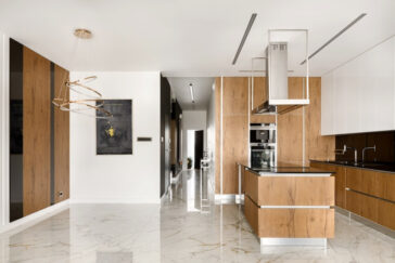 A closer look at Contemporary Apartment Renovation With Large-Format Tiles And Sleek Surfaces