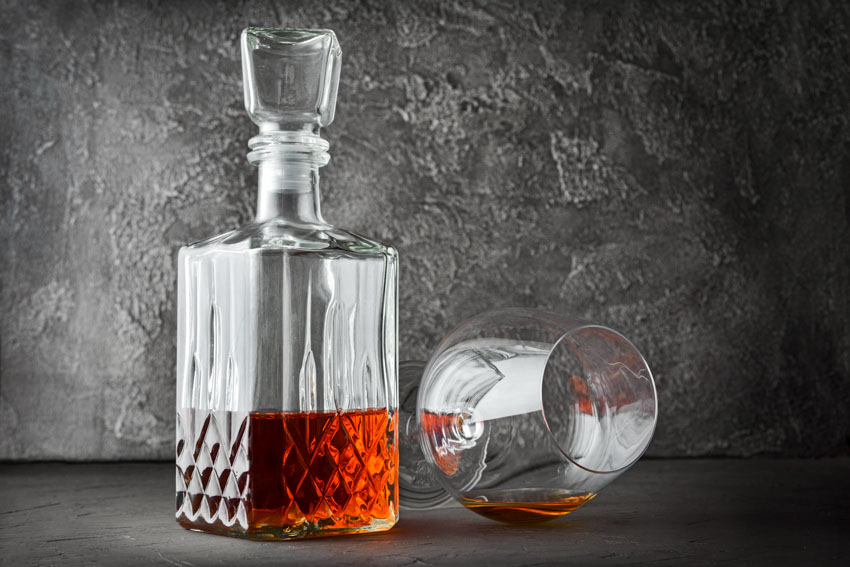 Twist decanter with glass and liquor