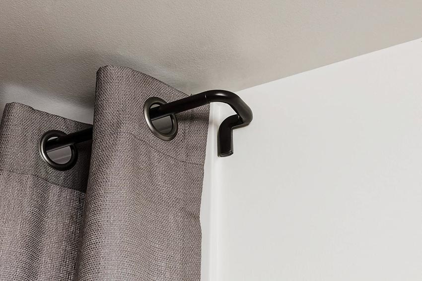 Wrap around curtain rod for home interiors