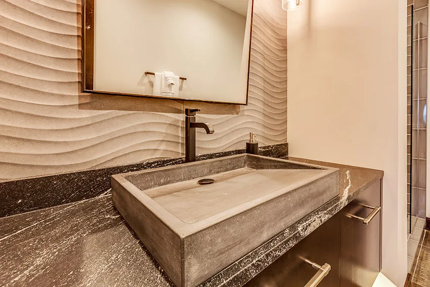 Bathroom sink with granite countertop wavy backsplash tile