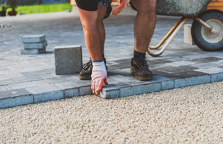 Installing concrete pavers with gravel