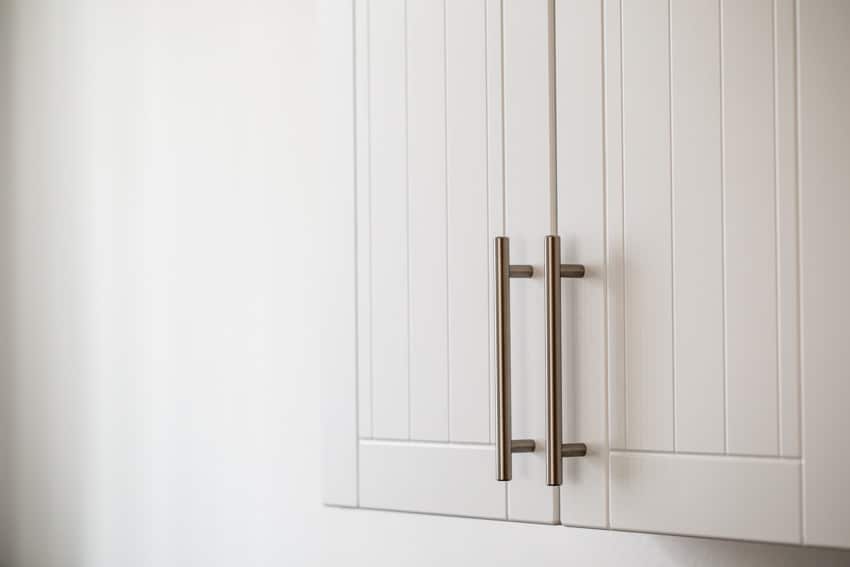 A pair of pulls for cabinet doors