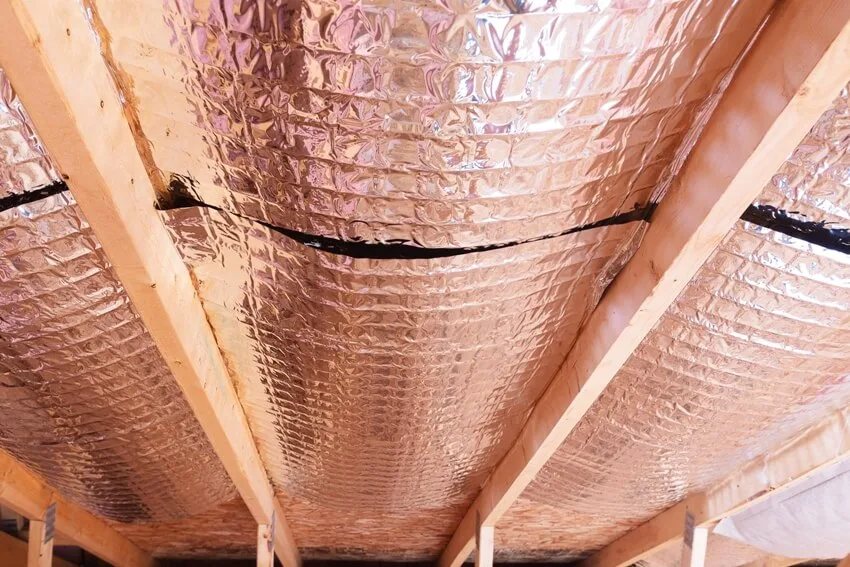 Attic roof ceiling with radiant insulation