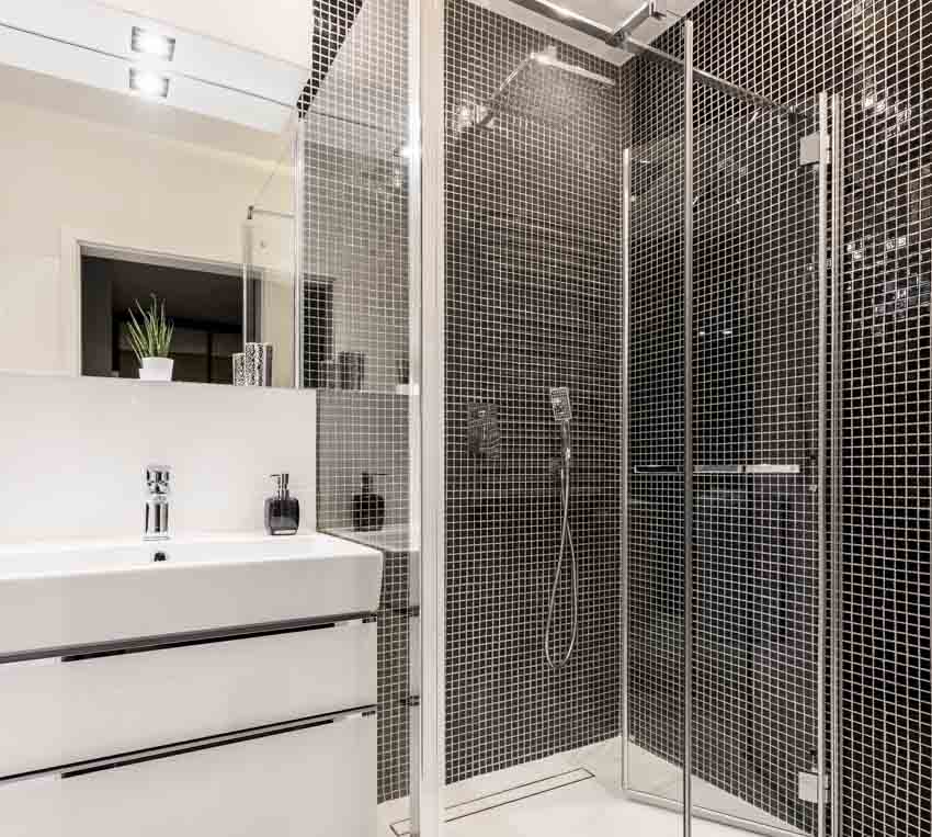 Bathroom with black square tile