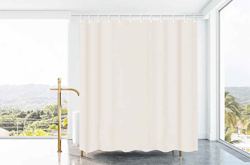 Bathroom with large windows and hemp shower curtain