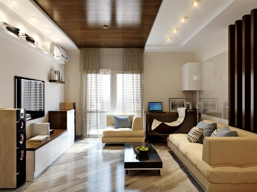 Beige room with comfy sofas, wooden center table and floor tiles