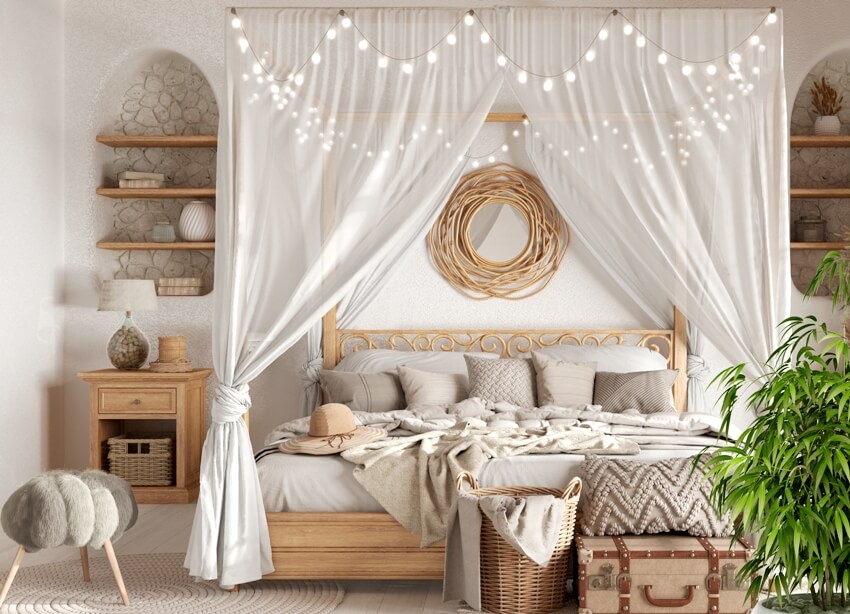 Bohemian bedroom interior with canopy bed attached to ceiling