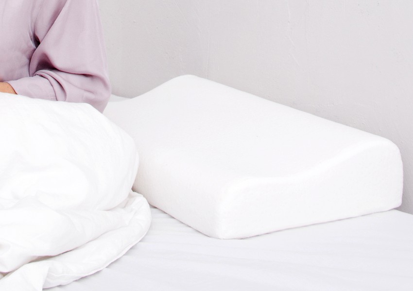 A comfortable memory pillow on bed 