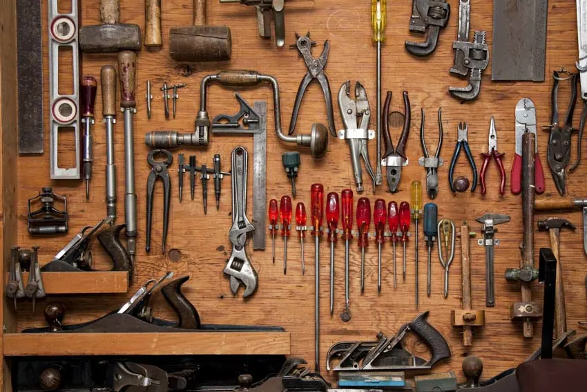 Different handyman tools organized inside a shed 