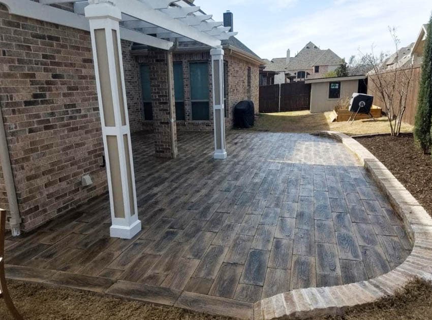 Empty outdoor patio with wood pavers