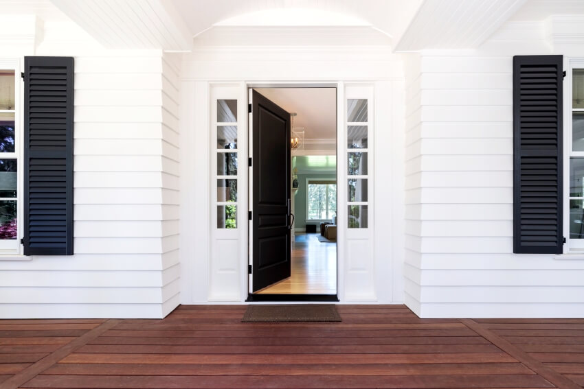 Entryway with dark painted doors and shutters