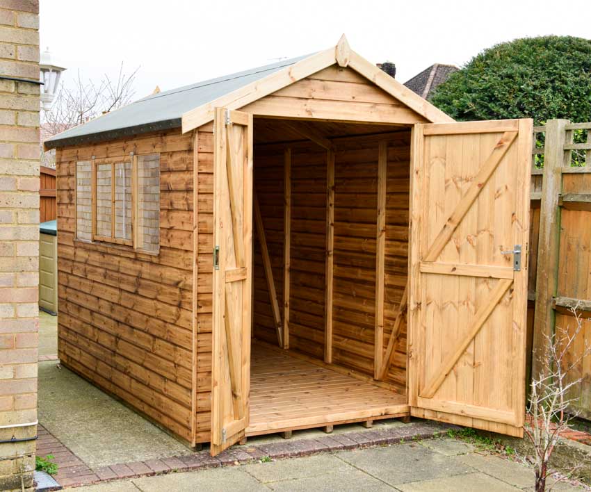 Garage shed made of wood with window and doors