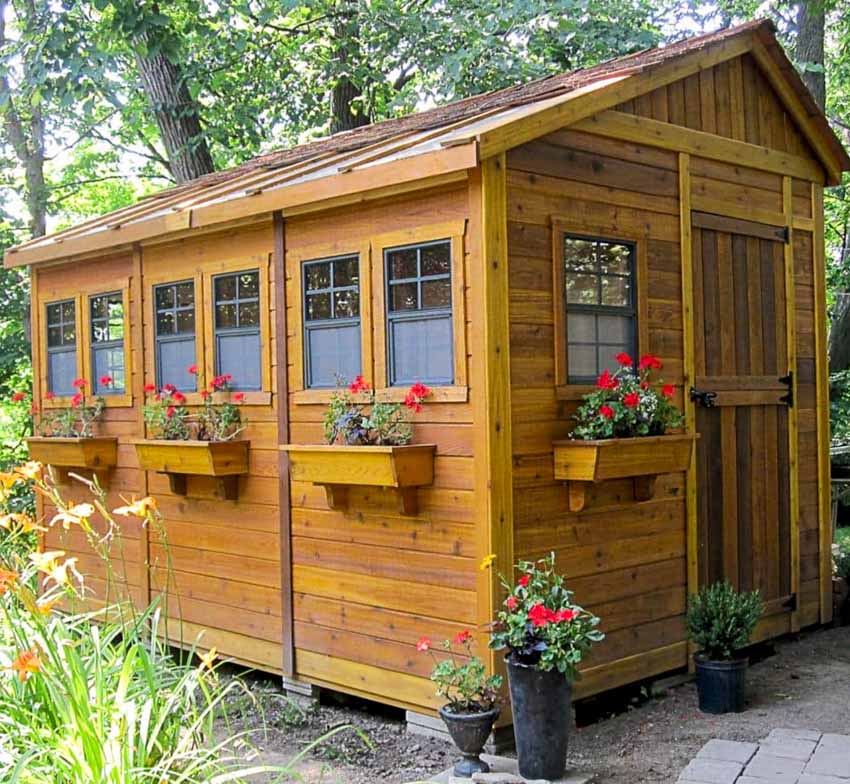 Garden shed made of wood with door and windows