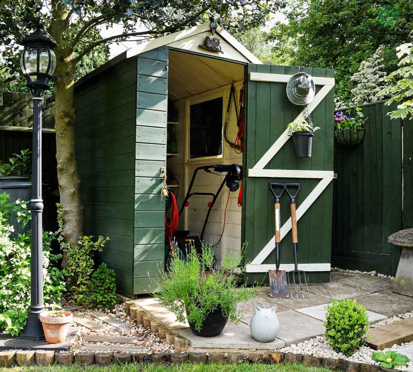 Garden shed with various tools and items