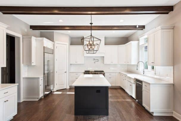 Kitchen Ceiling Beams Pictures Design Ideas   Kitchen With Ceiling Beams Wood Flooring Center Island Countertops Pendant Light Backsplash Window And White Cabinets Is 608x406 