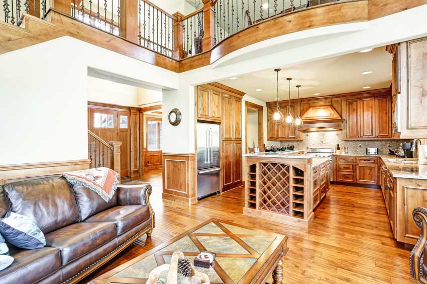 Living room and kitchen combined with stained maple cabinets