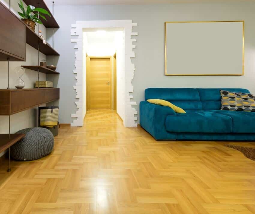 Room with modern wooden shelf and zigzag style wood floating-style floors