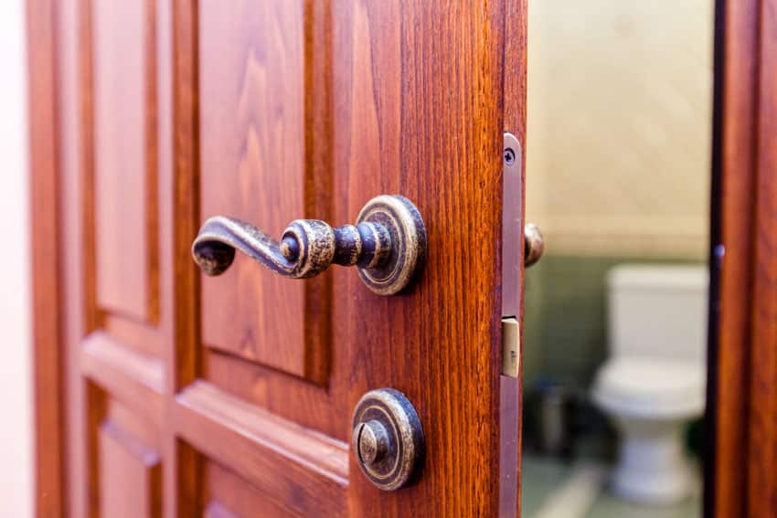 Mahogany wooden door with lock and knob