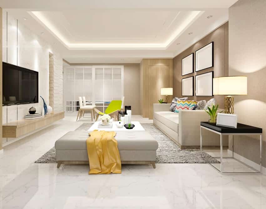 A modern living room with beige tones, clean marble floors and luxury furniture