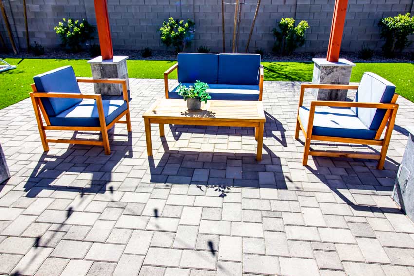 Unilock pavers, table, and chairs