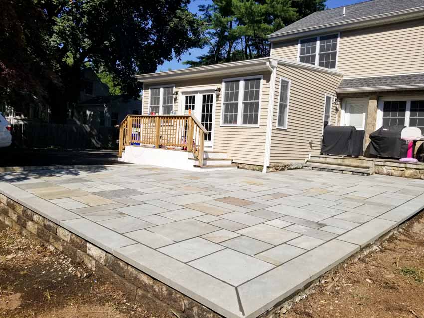 Bluestone pavers with house siding