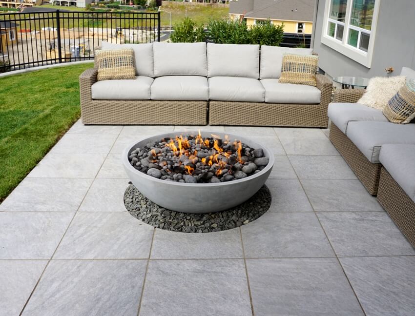 Patio with sandstone floors outdoor sofa and table